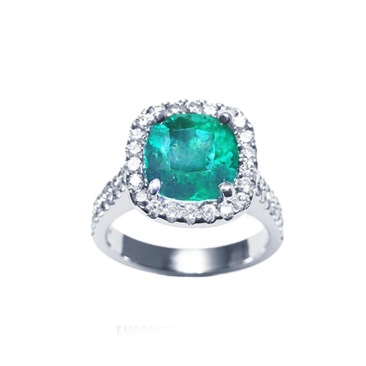 Front position, top view of a Women's emerald ring cushion cut with halo natural diamond crafted in 14k white gold.
