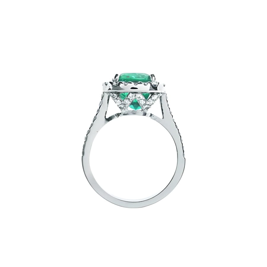 Cushion cut 3.92 ct. deep bluish-green natural emerald ring with diamond halo in 14K white gold.