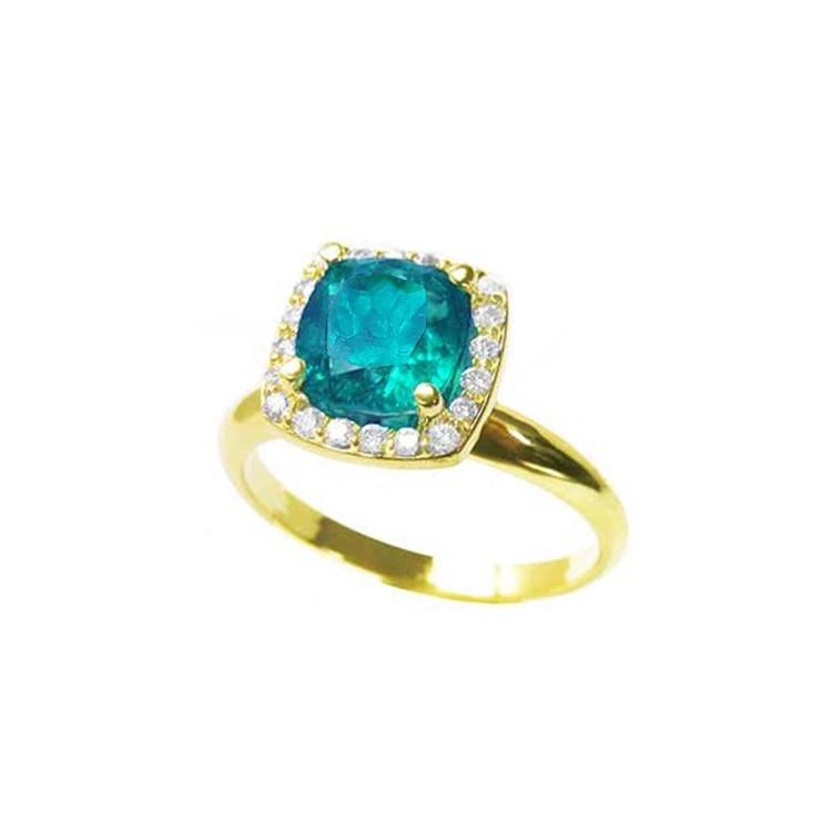 14K gold ring with a cushion-cut emerald and diamond halo.