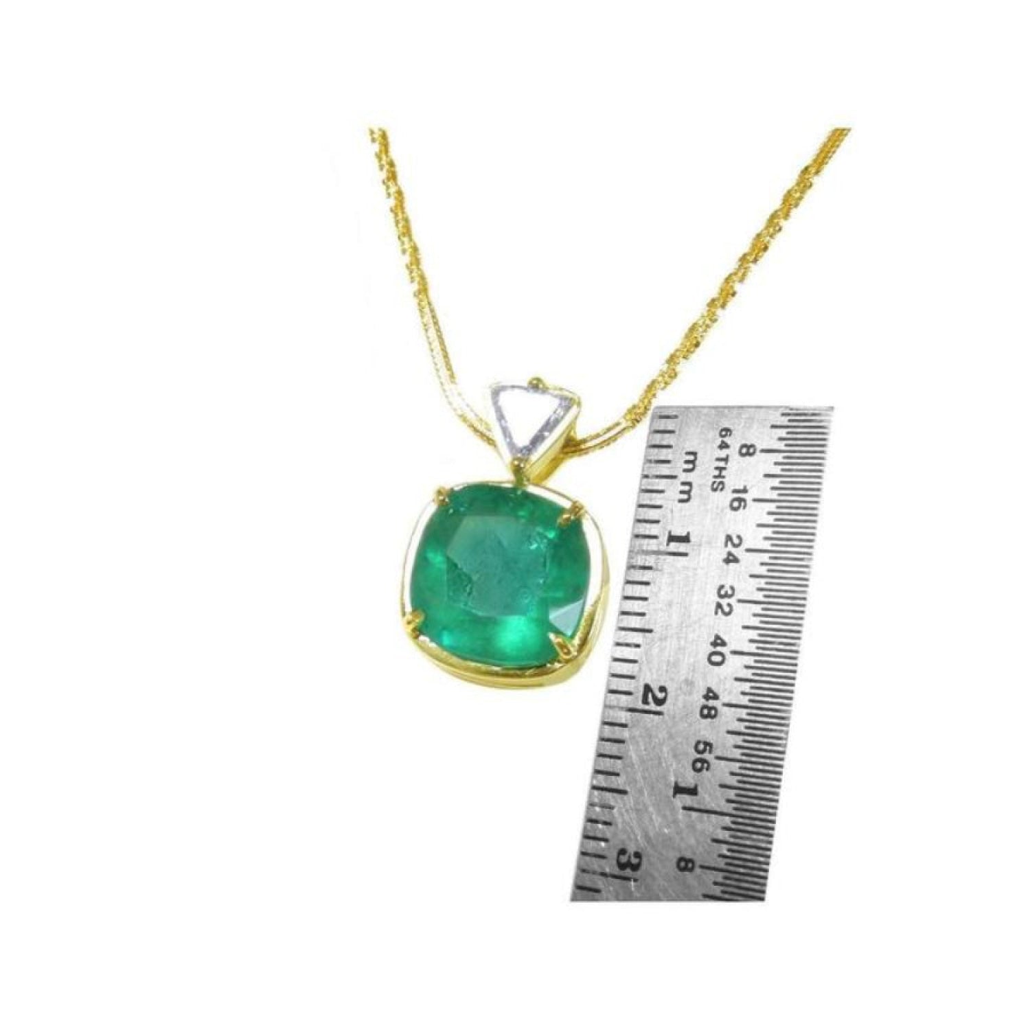 Cushion cut 4.84 ct. natural Colombian emerald pendant in 18K yellow gold on a delicate chain.