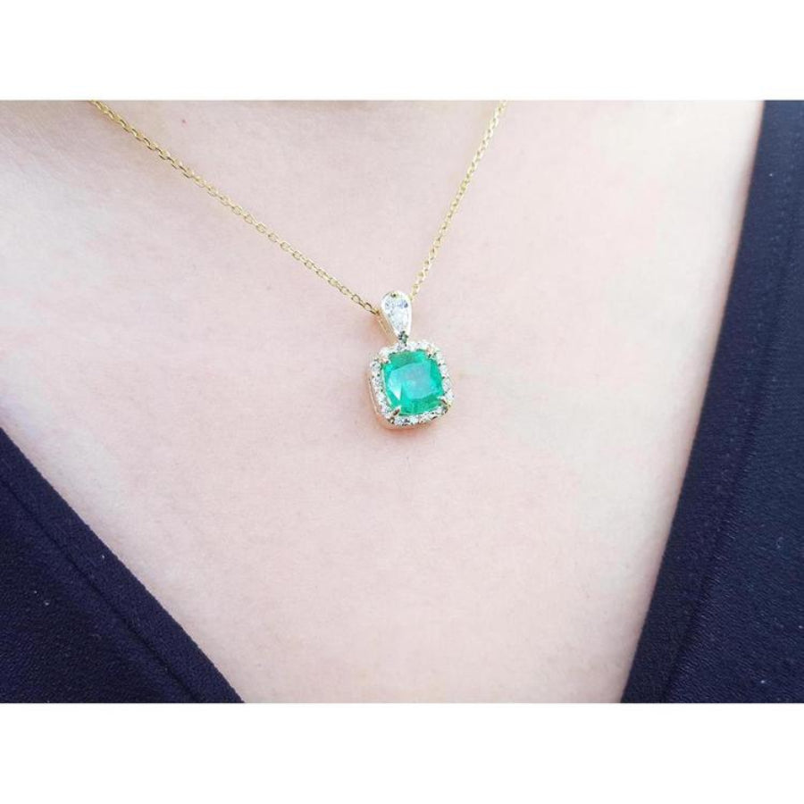 1.99 ct cushion-cut emerald pendant with halo natural diamonds on a 14K yellow gold chain.