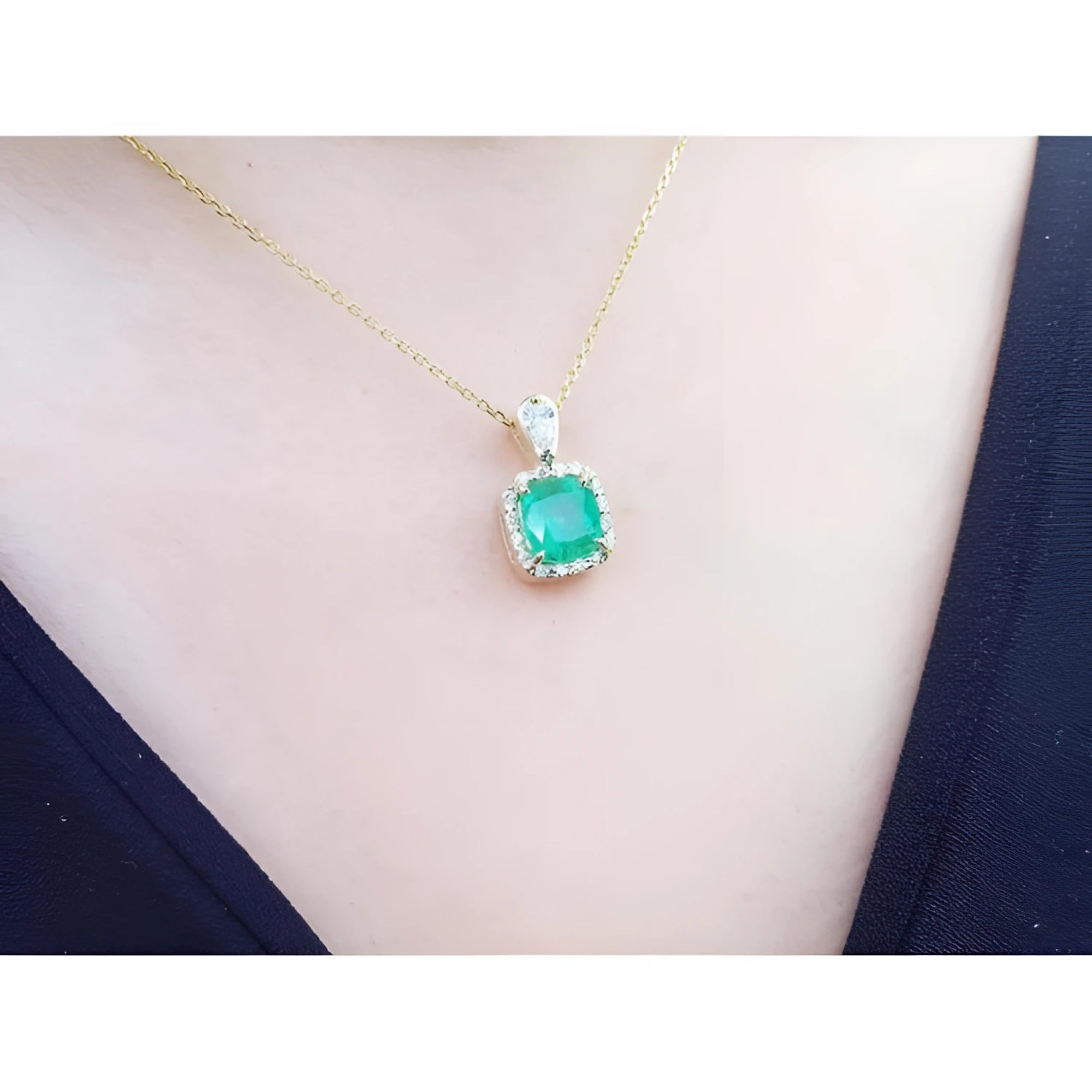 1.99 ct cushion-cut emerald pendant with halo natural diamonds on a 14K yellow gold chain.
