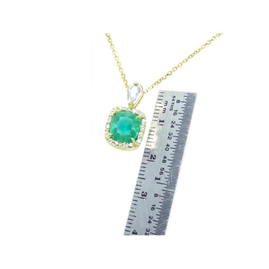 1.99 ct. cushion-cut emerald pendant with halo natural diamonds on a 14K yellow gold chain.