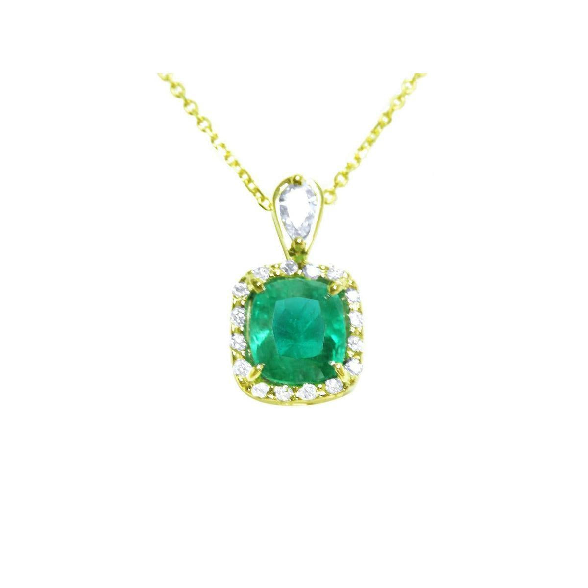 Gold necklace with a cushion cut natural colombian emerald pendant with a halo diamond, topside view.