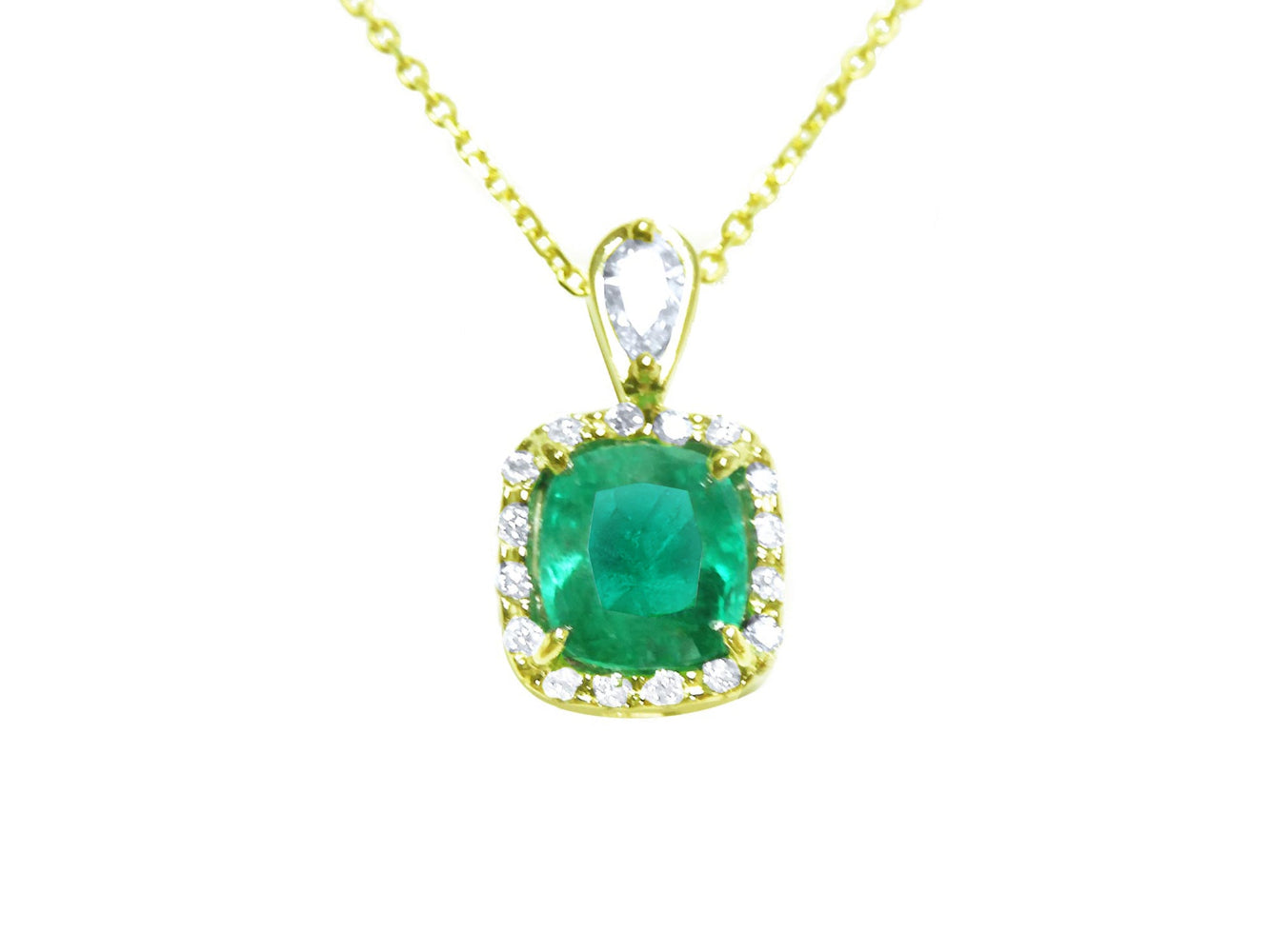 Gold necklace with a cushion cut natural colombian emerald pendant with a halo diamond, topside view.