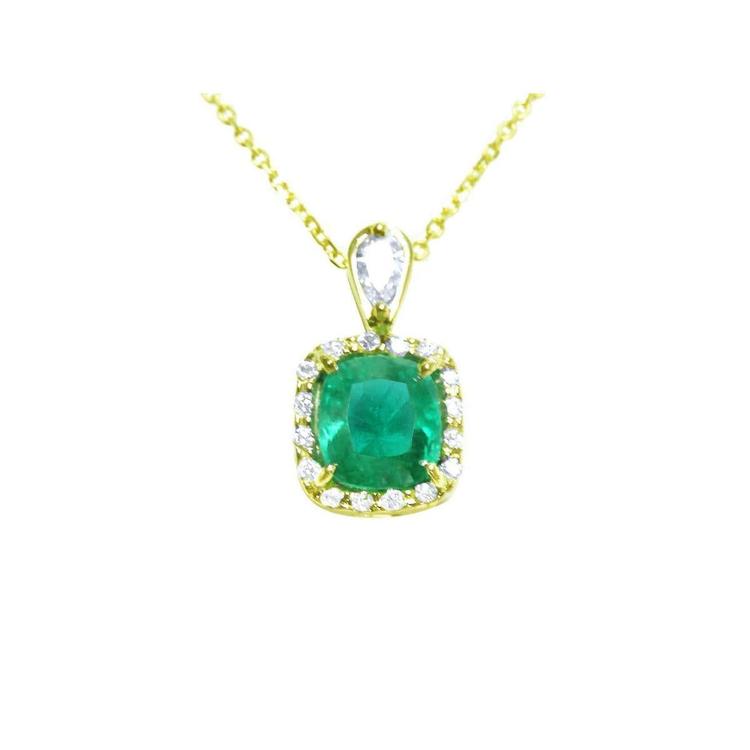 Gold necklace with a cushion cut natural colombian emerald pendant with a halo diamond, topside view.