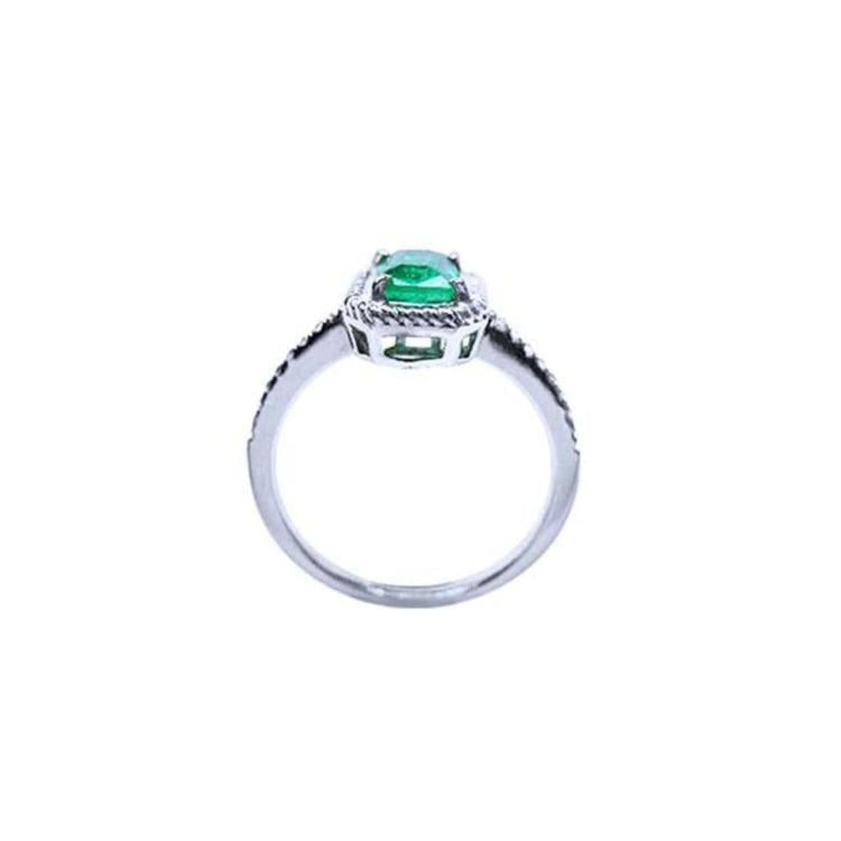 14K white gold cushion-cut emerald solitaire ring with rope detailing.