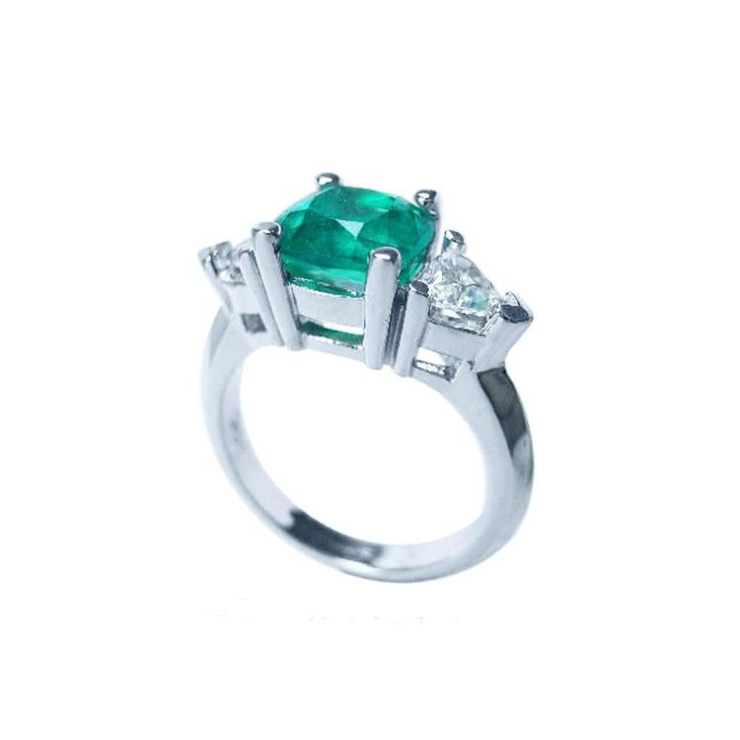 2.18 ct cushion cut Colombian emerald ring with trillion side diamonds in 14K white gold.