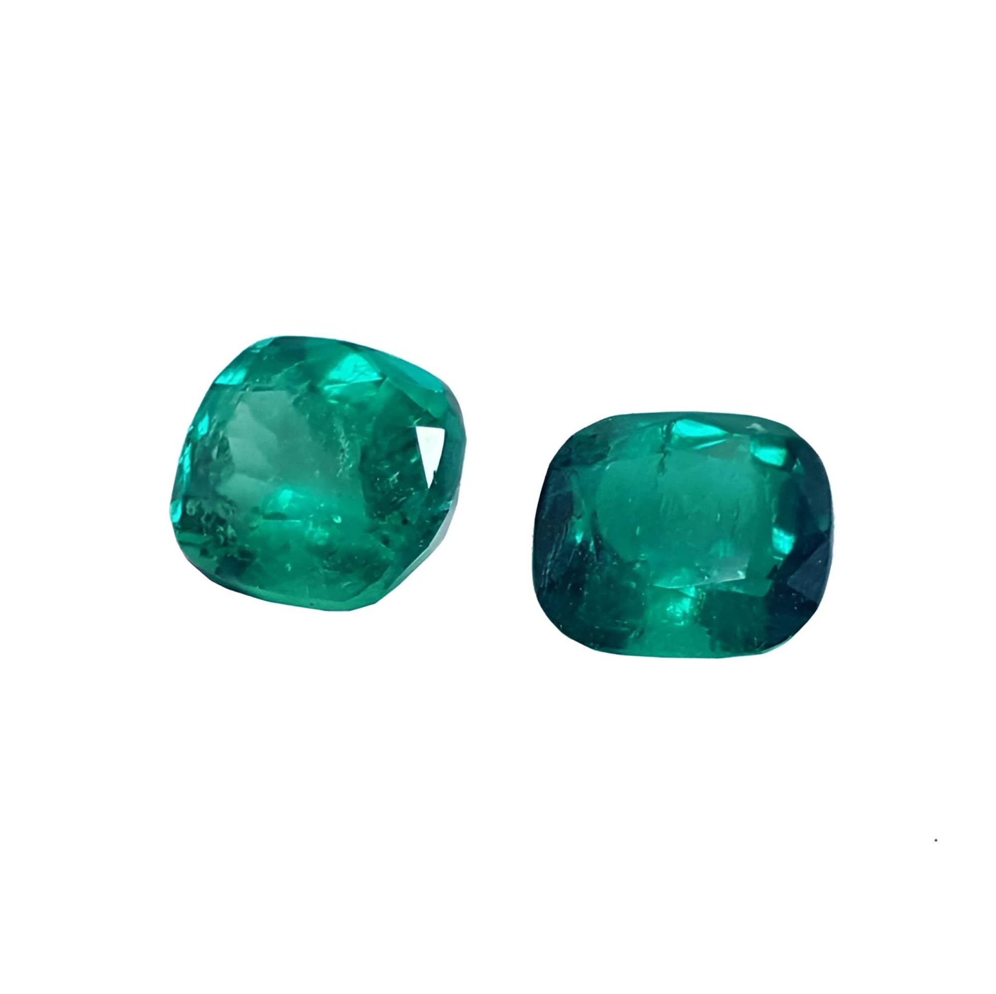 Matching pair cushion cut loose colombian emeralds ideal for a unique design of high quality earrings.
