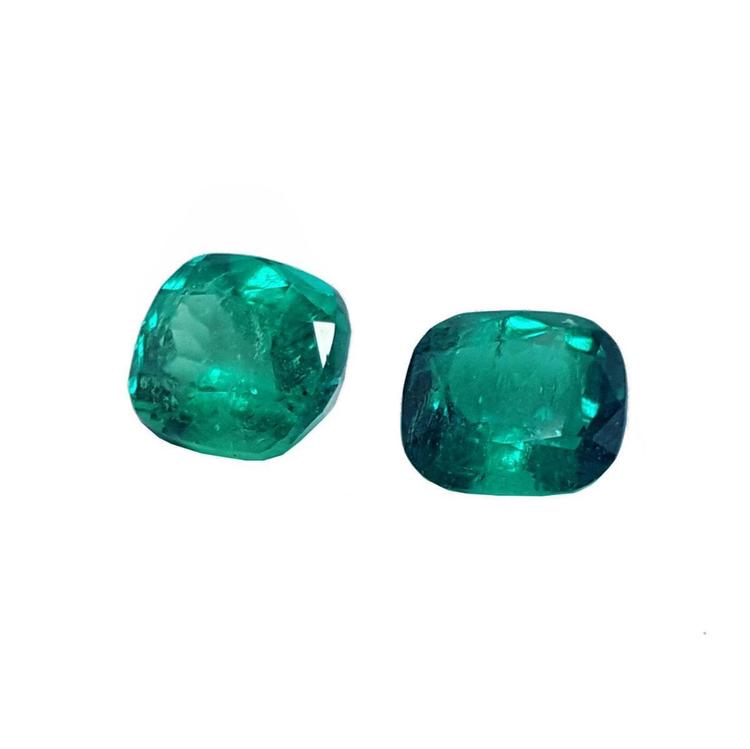 Matching pair cushion cut loose colombian emeralds ideal for a unique design of high quality earrings.