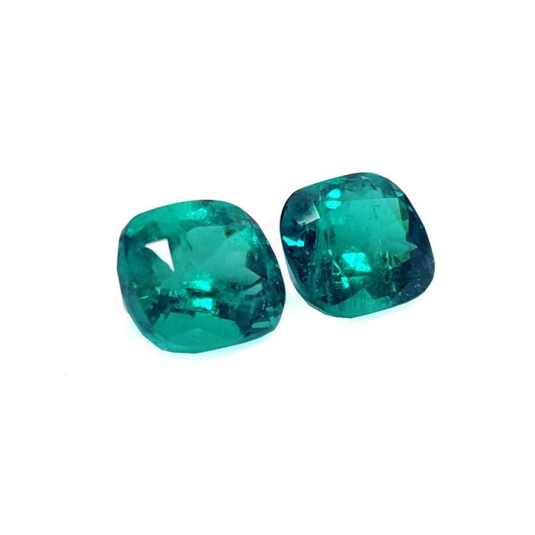 Matching pair cushion cut loose colombian emeralds perfect for a unique design of high quality jewelry.