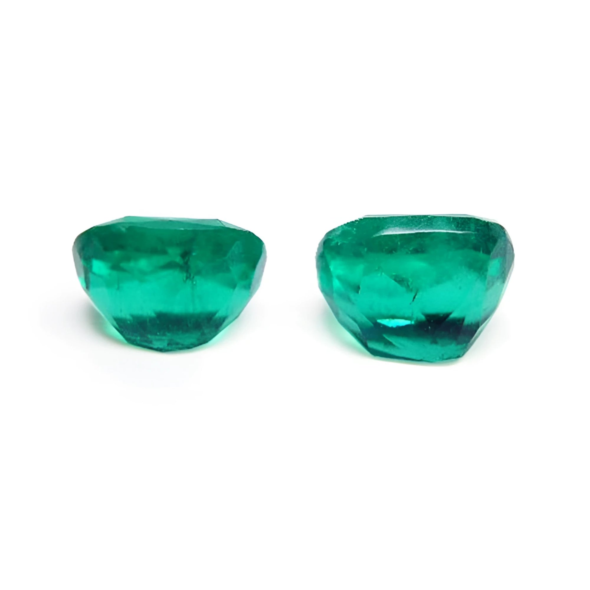 Matched pair of 3.36 carat cushion cut genuine loose emeralds with vibrant green color.