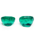 Matching pair cushion cut loose colombian emeralds underside girdle and pavilion view