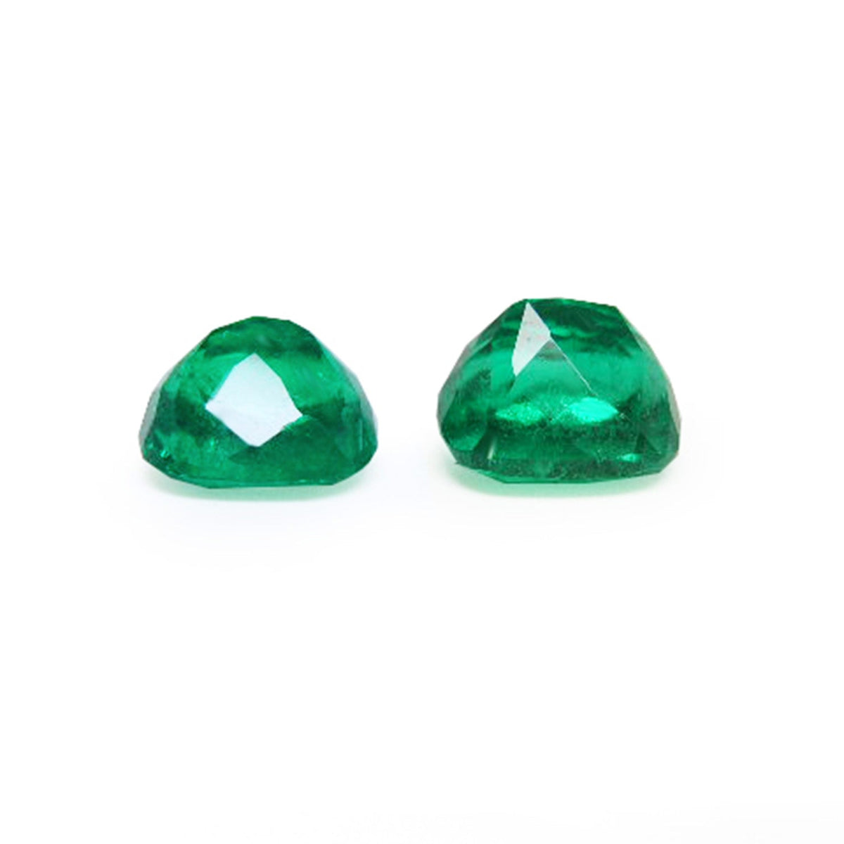 Matching pair cushion cut loose colombian emeralds upside down pavilion view