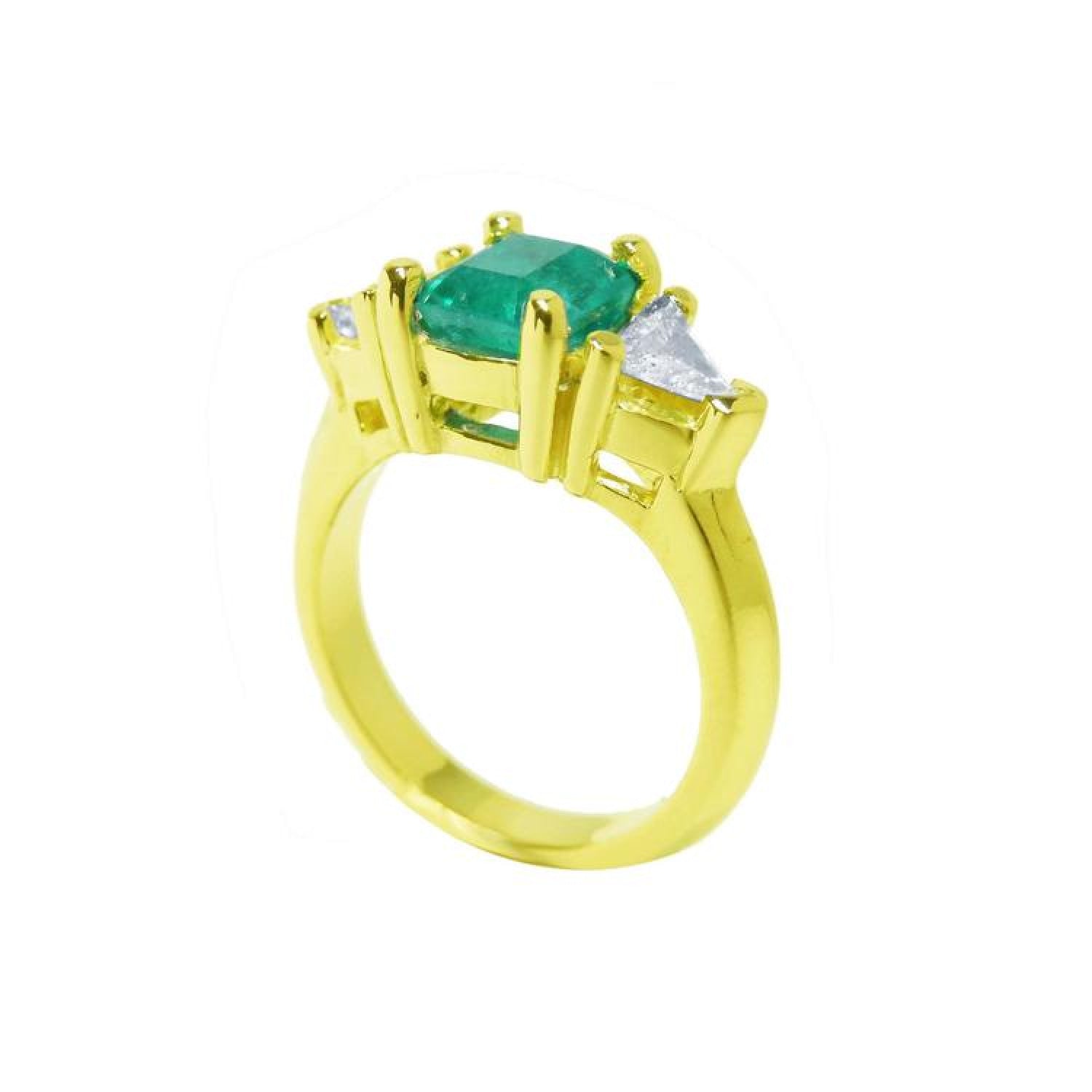 1.47 ct. emerald-cut Colombian emerald ring with trillion diamonds in 18k yellow gold.