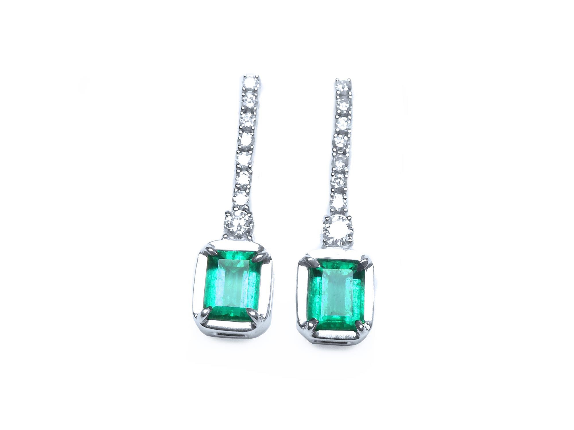 Pair of natural emerald dangle earrings with diamond accents in 18k white gold, front side top view