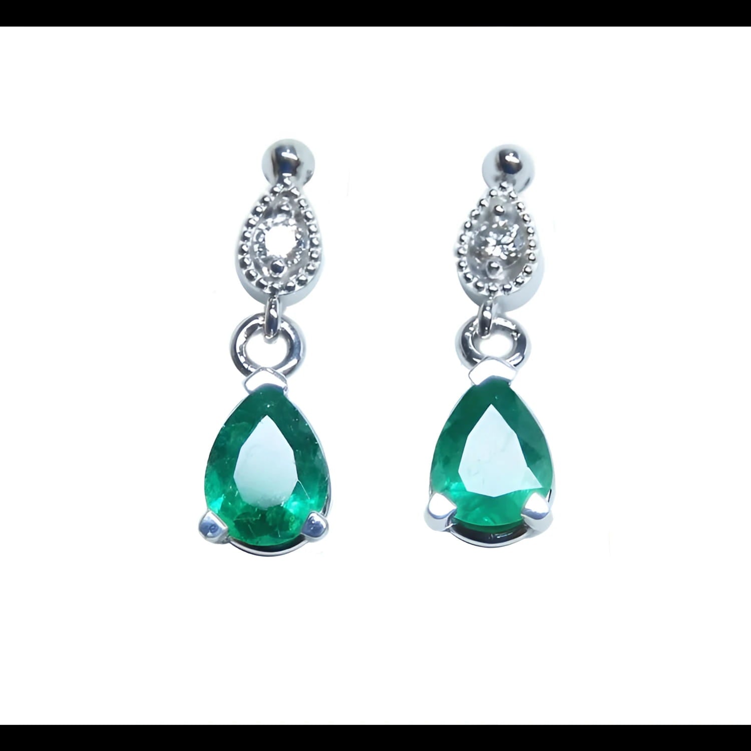 Dangling teardrop emerald earrings in 14K white gold with diamond-studded pear links.