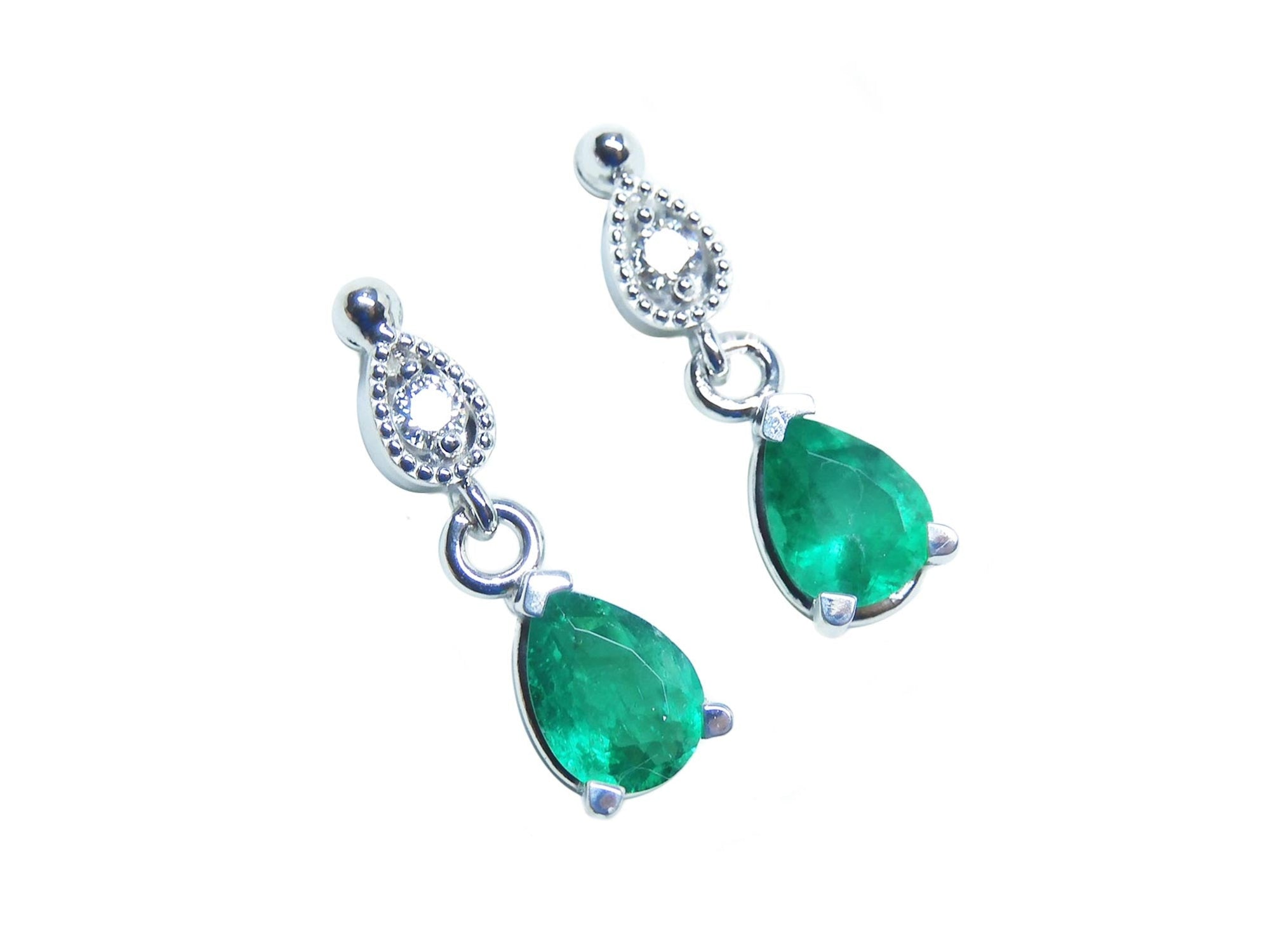 Right position emerald teardrop earrings 14k white gold full top view

