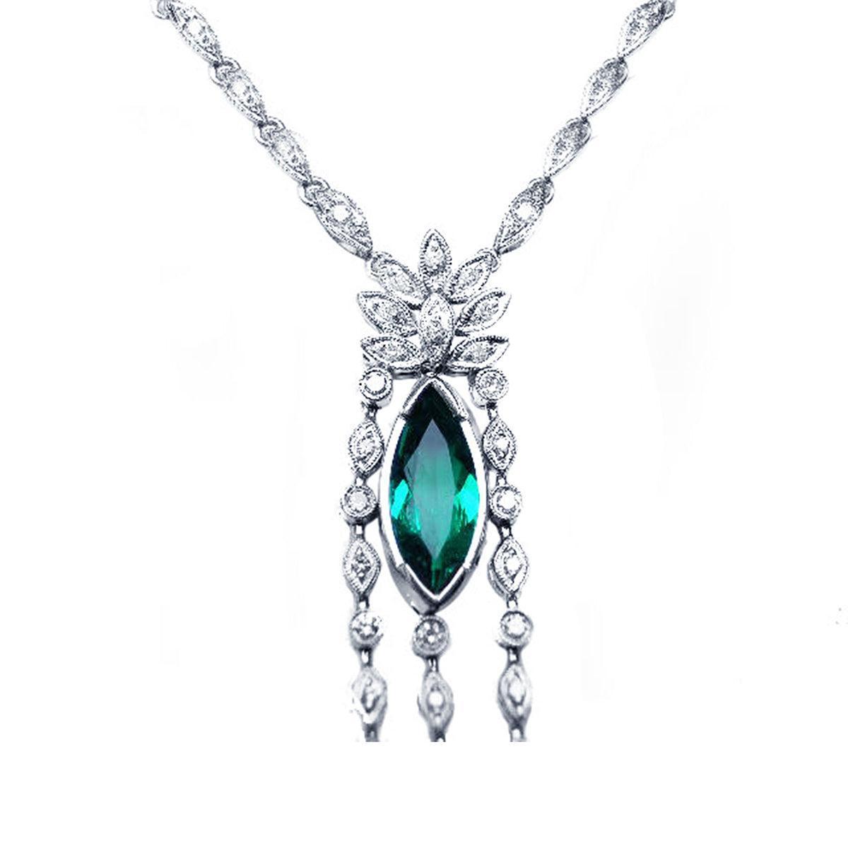 close view of a Marquise Necklace 2.12 ct. Colombian Emerald 14K White Gold on white background