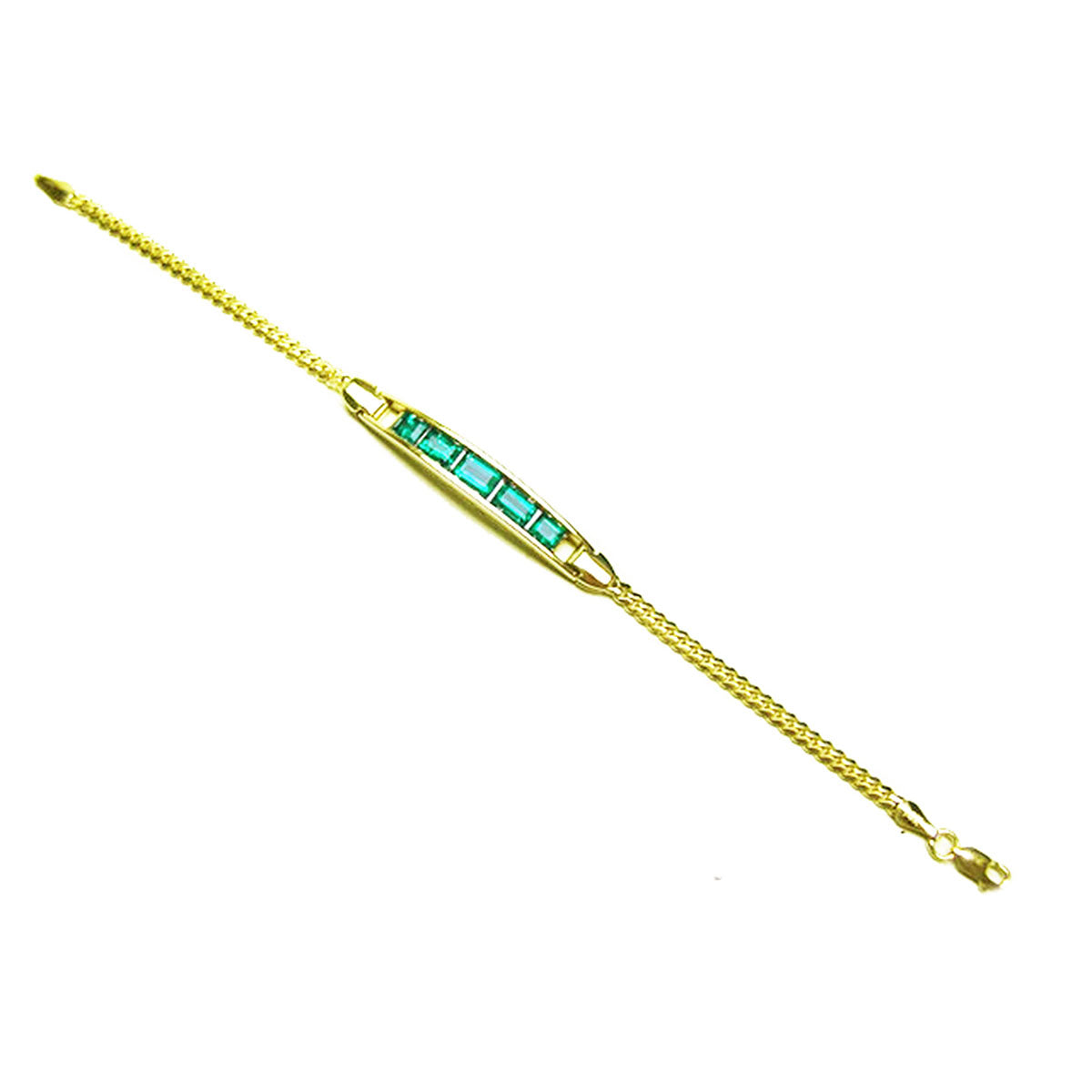 A distant view of a gold bracelet with emeralds stones on a white background.