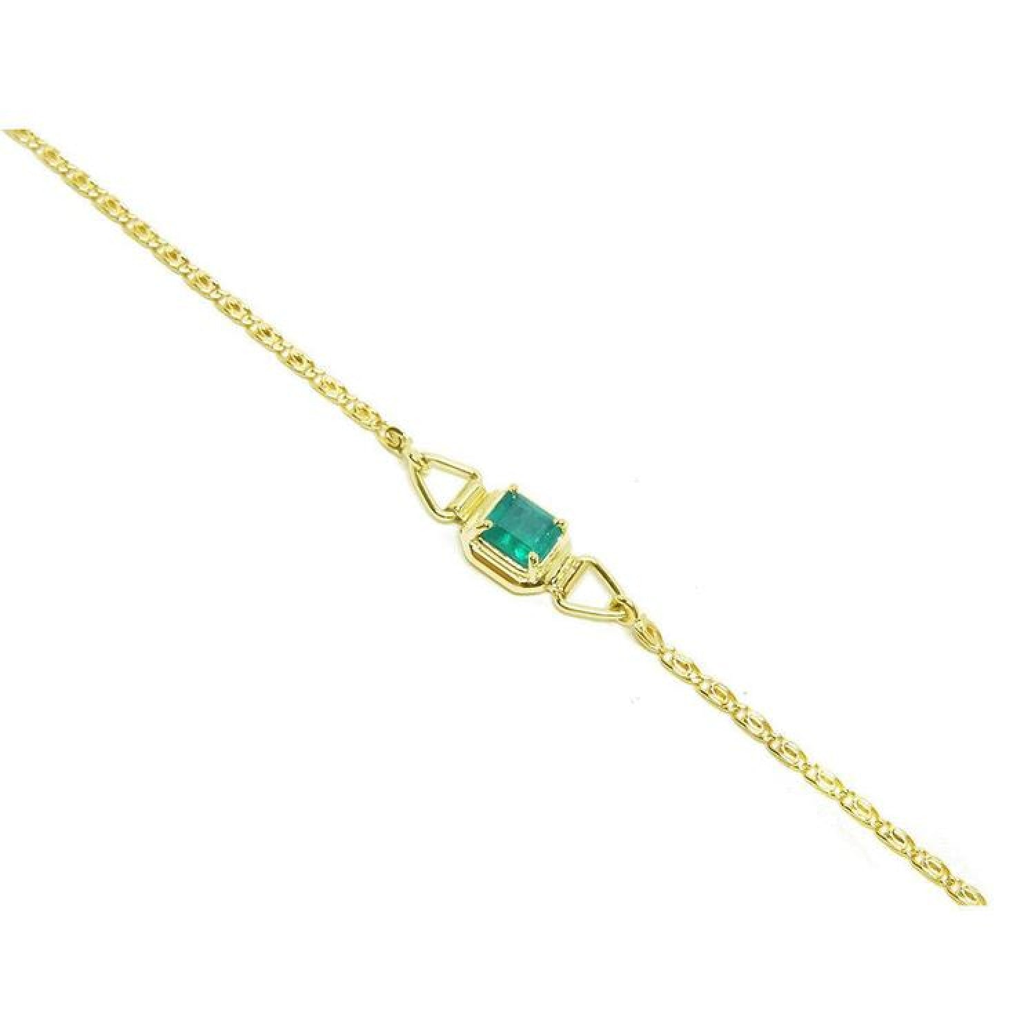 14K yellow gold solitaire bracelet with a deep green Colombian emerald.