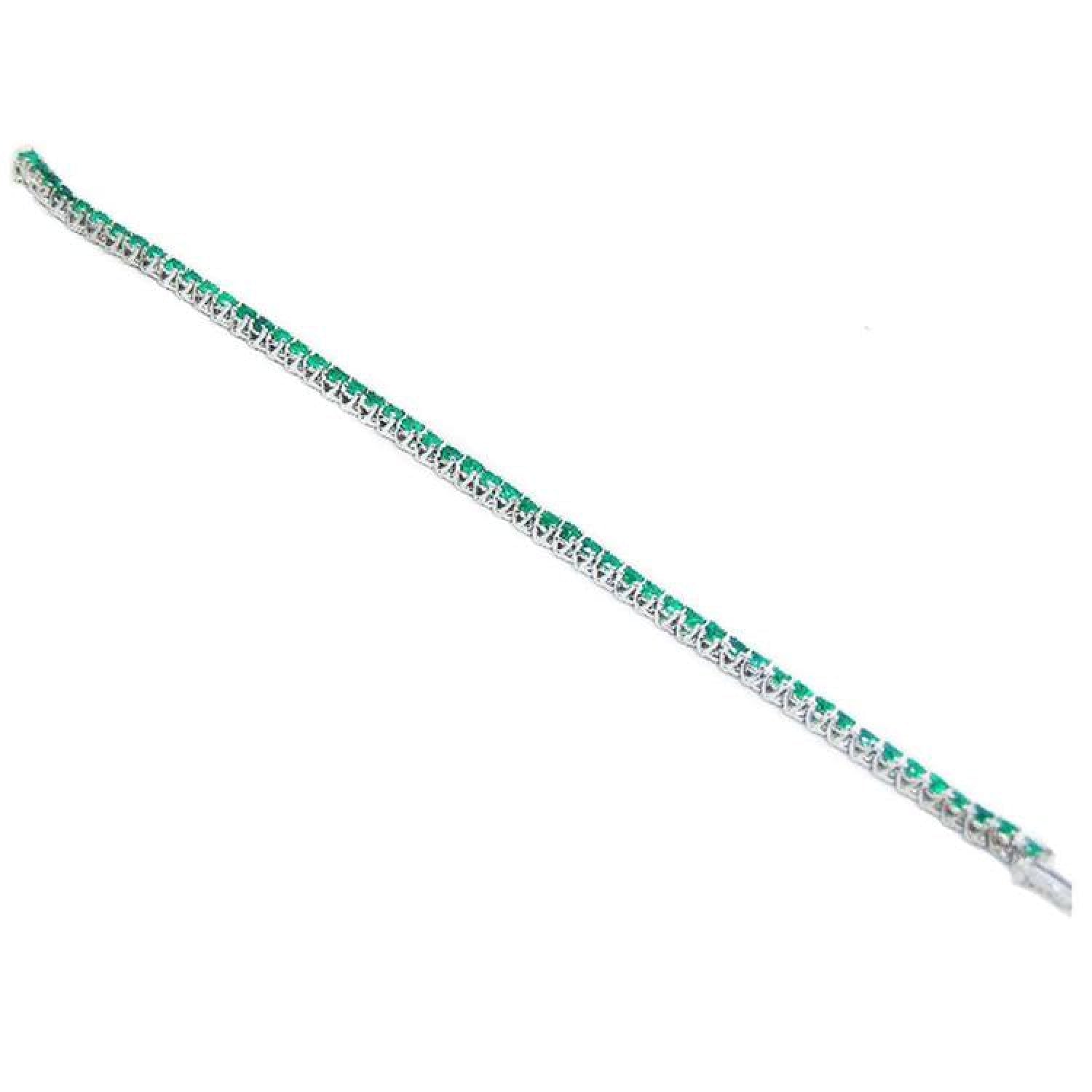 Natural Colombian emeralds tennis bracelet, 14K gold, round cut, prong set, sparkling medium deep green.