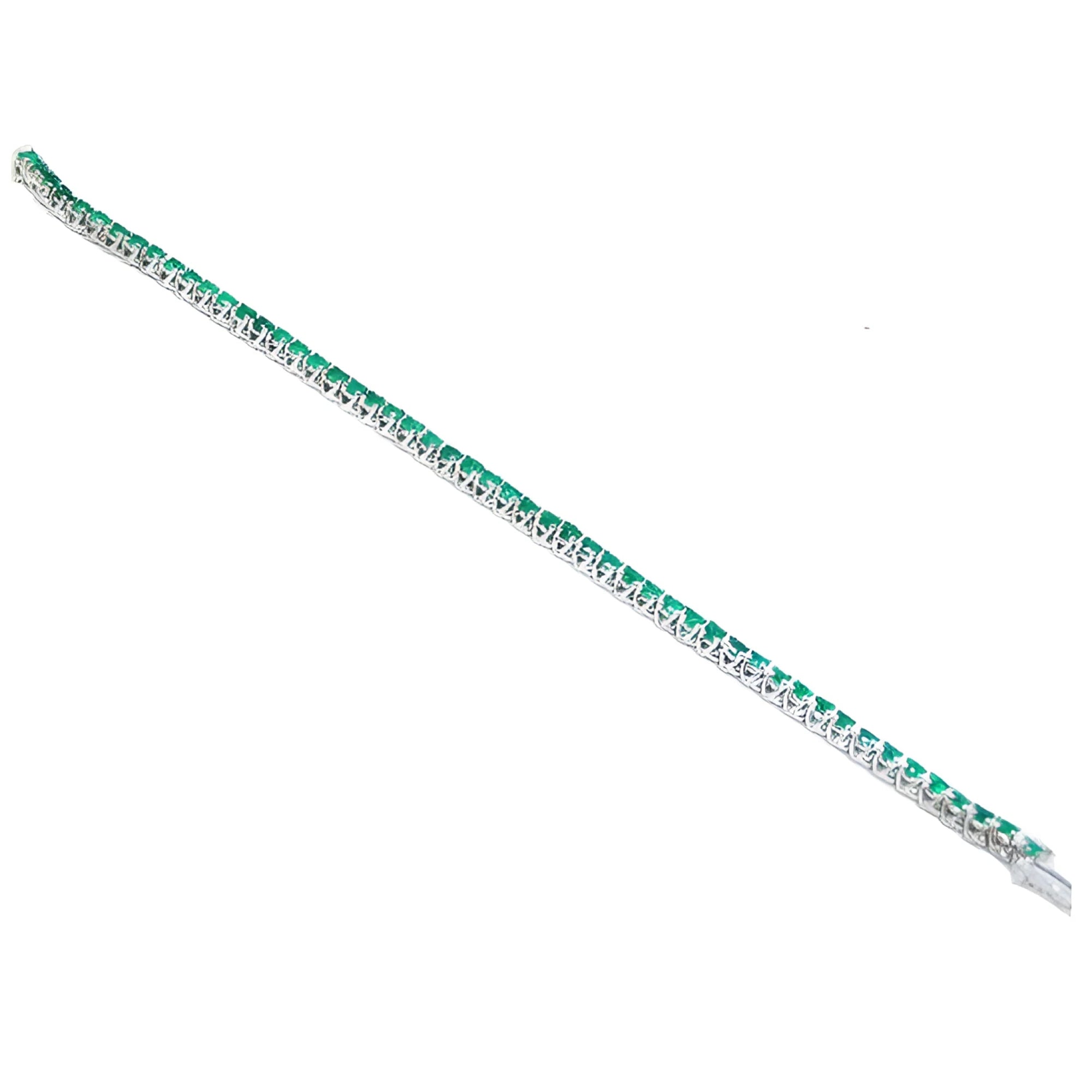 Natural Colombian emeralds tennis bracelet, 14K gold, round cut, prong set, sparkling medium deep green.