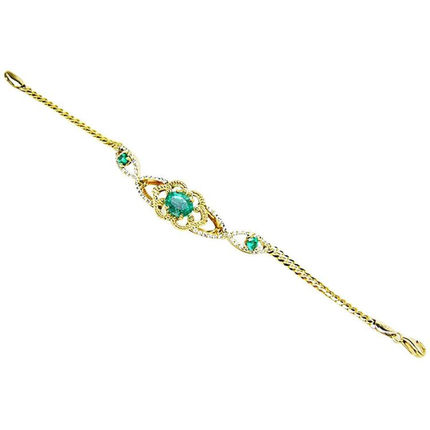 Vintage 14K yellow gold bracelet with oval emeralds and natural diamonds.