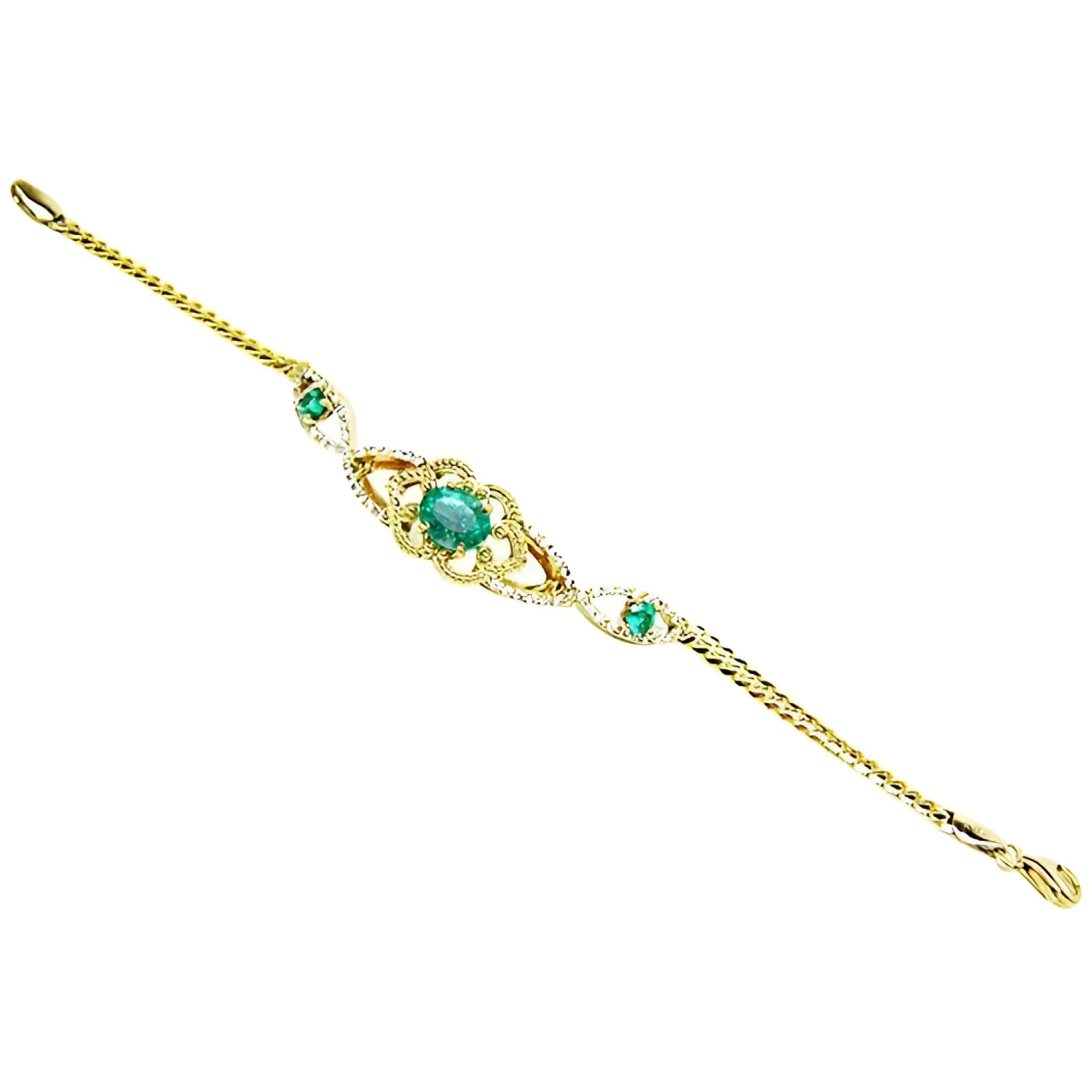 Vintage 14K yellow gold bracelet with oval emeralds and natural diamonds.