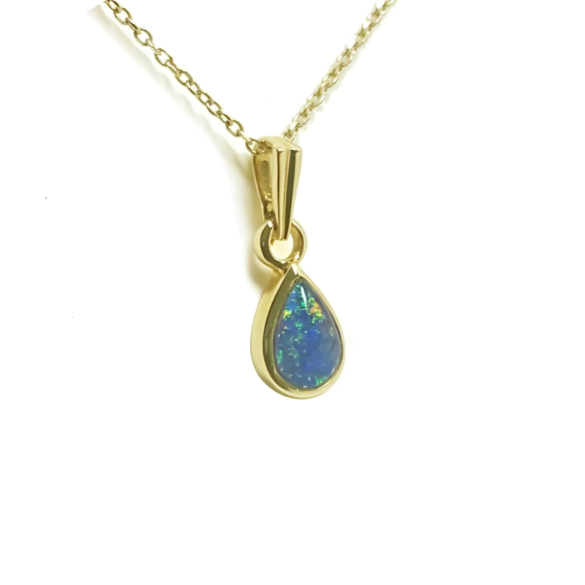 Pear-shaped Australian doublet opal pendant with bluish-green sparkles, bezel set in 14K yellow gold.