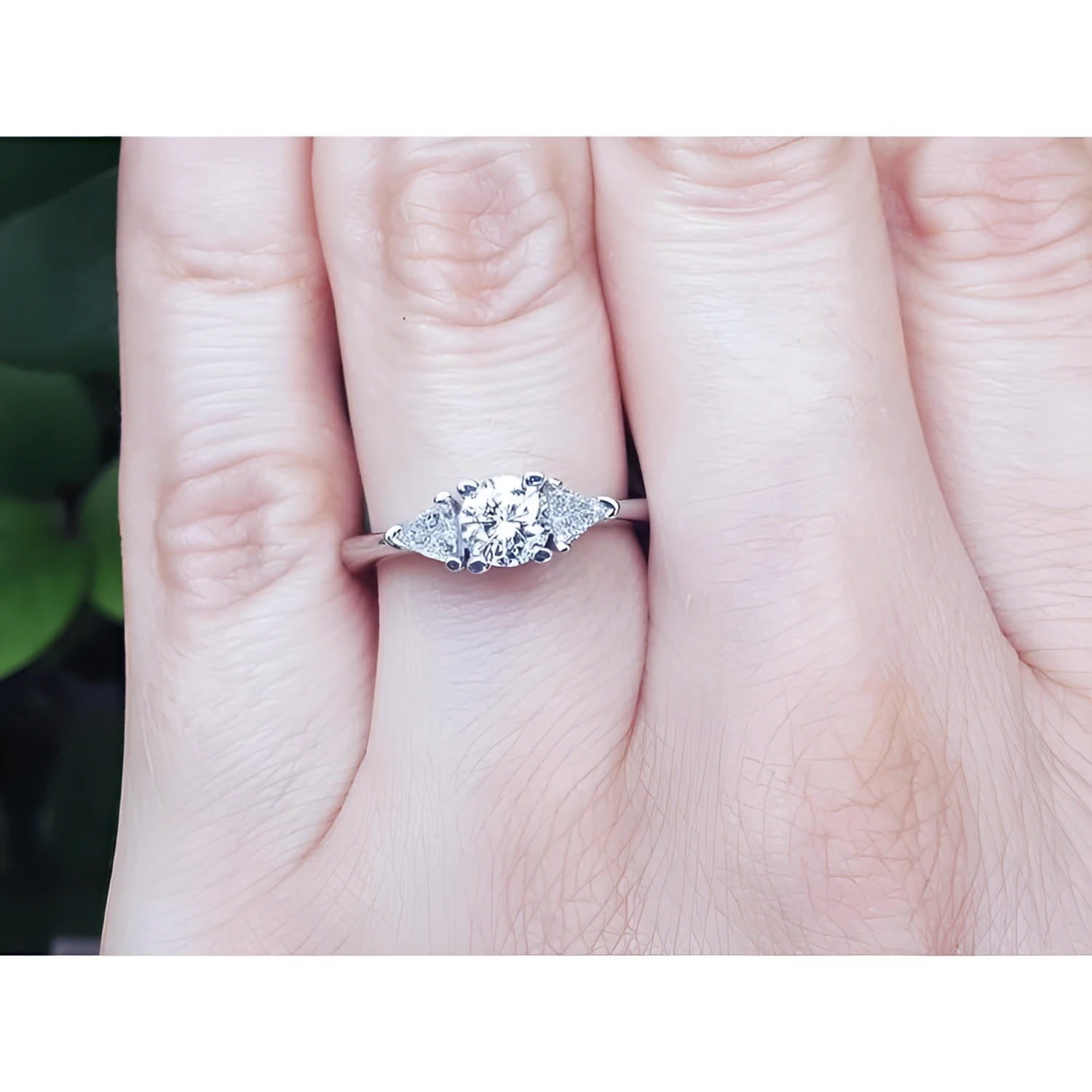Natural three stone trillion side diamond ring for women in 14k white gold.