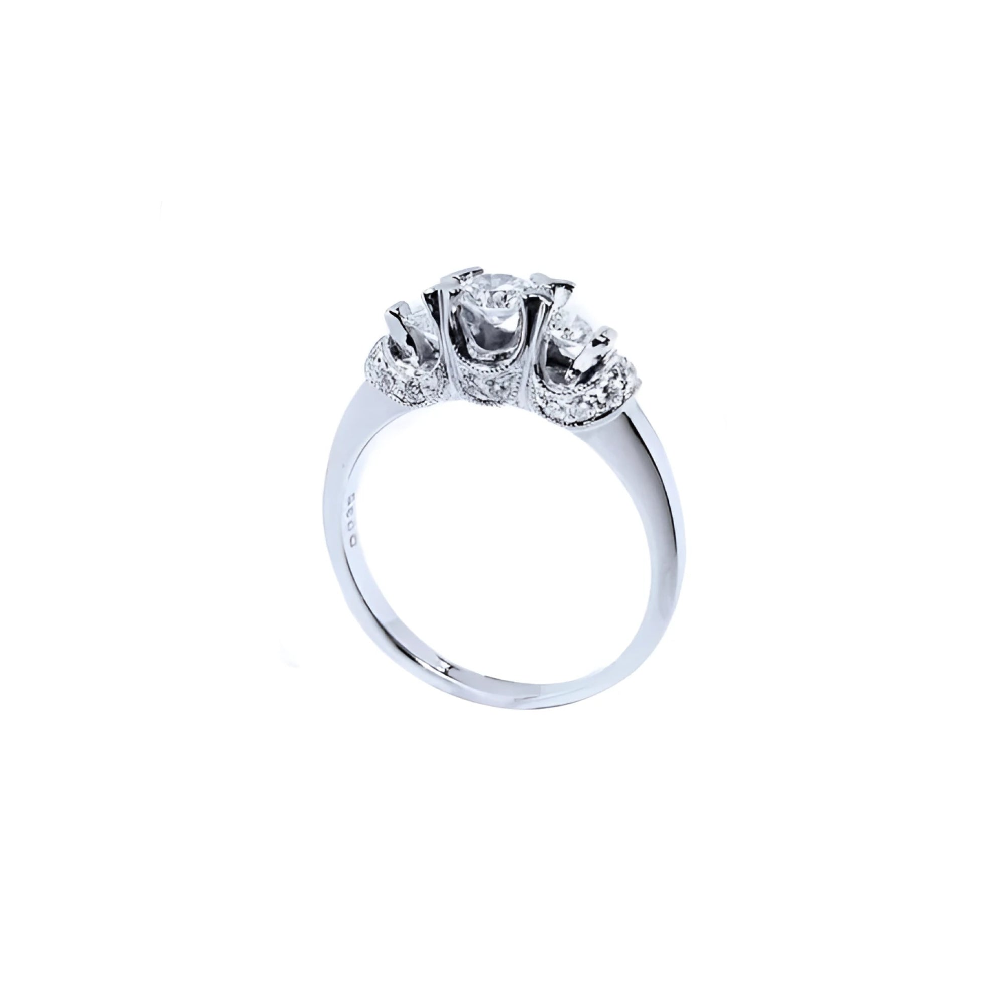 14K white gold three-stone engagement ring with round cut diamonds and pave set accents.