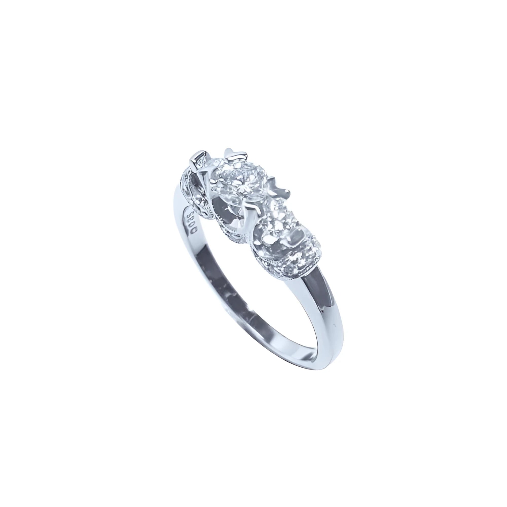 14K white gold three-stone round cut diamond engagement ring with pave set accent diamonds.