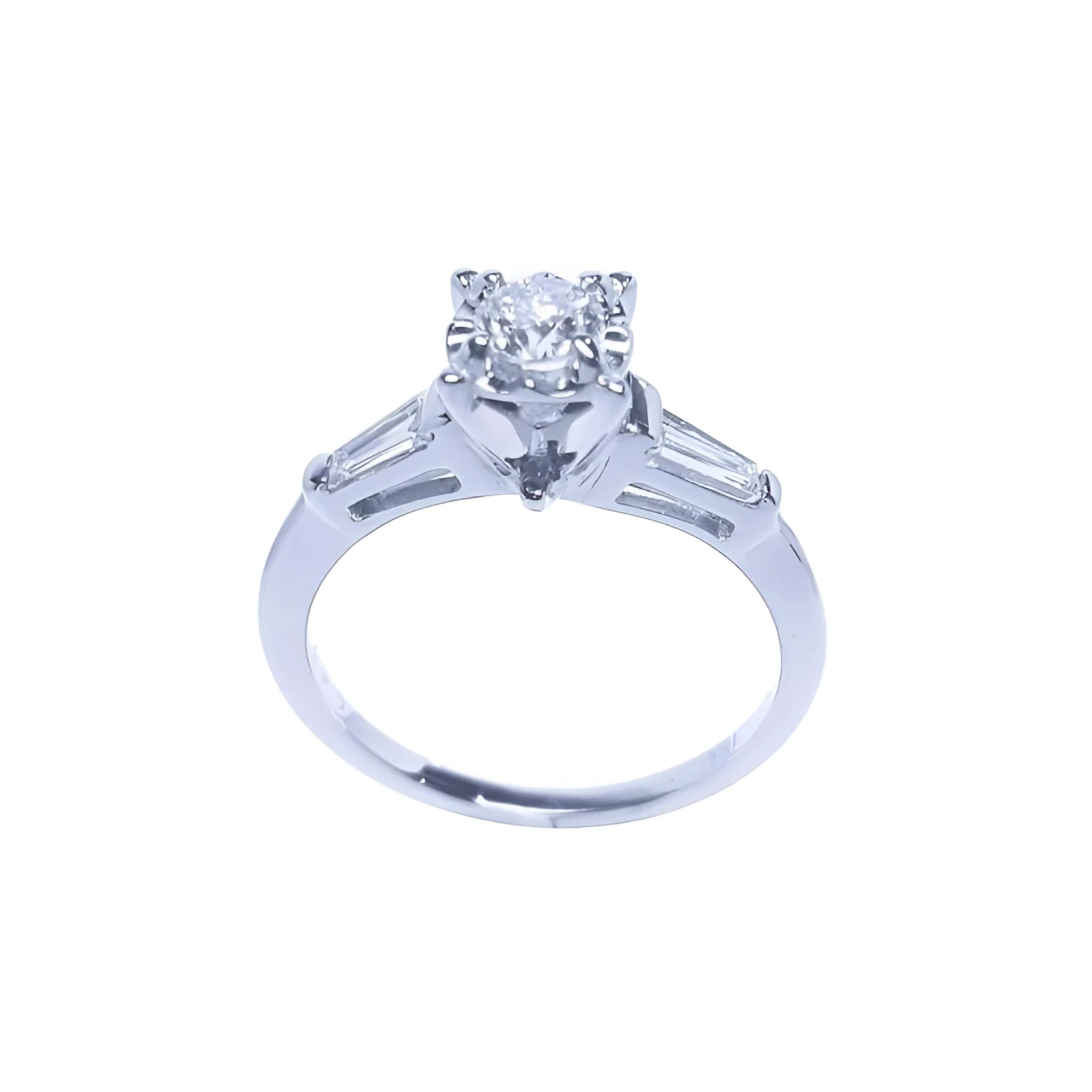 14k white gold engagement ring with a round central diamond and two baguette side diamonds.