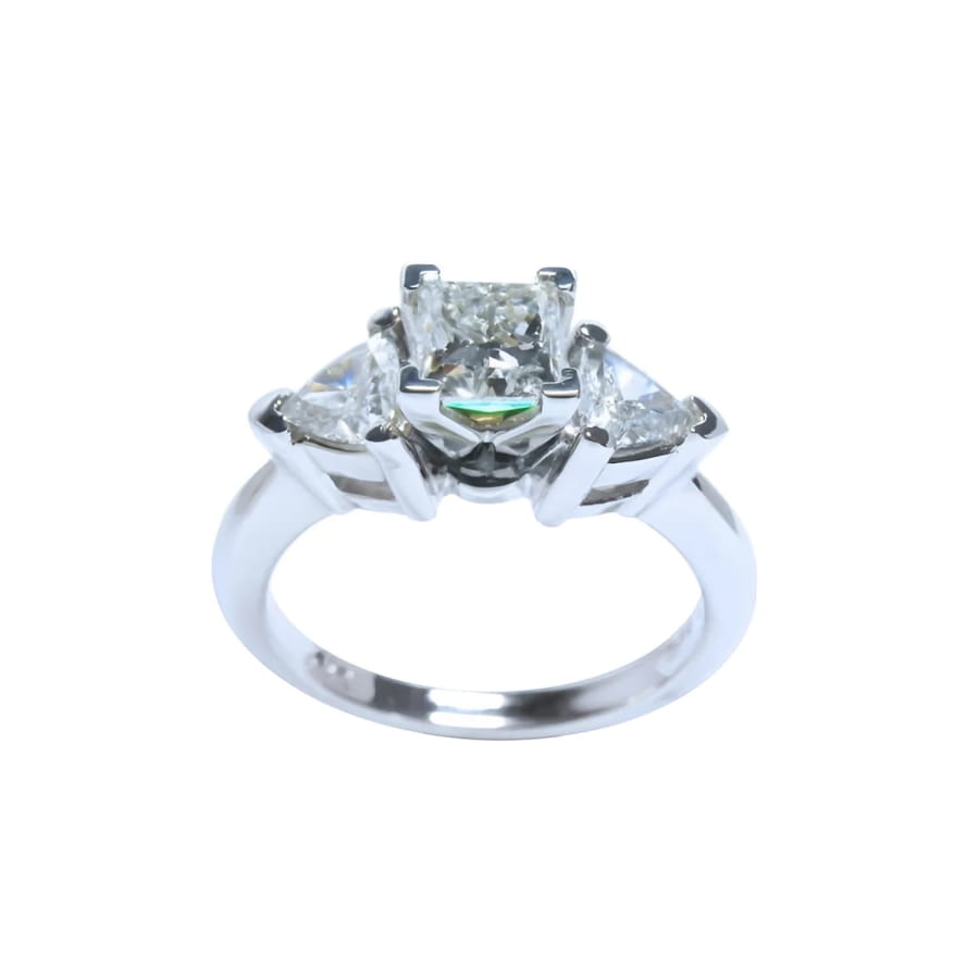 14K white gold ring with a princess cut diamond center and trillion side diamonds.