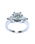 14K white gold ring with a princess cut diamond center and trillion side diamonds.