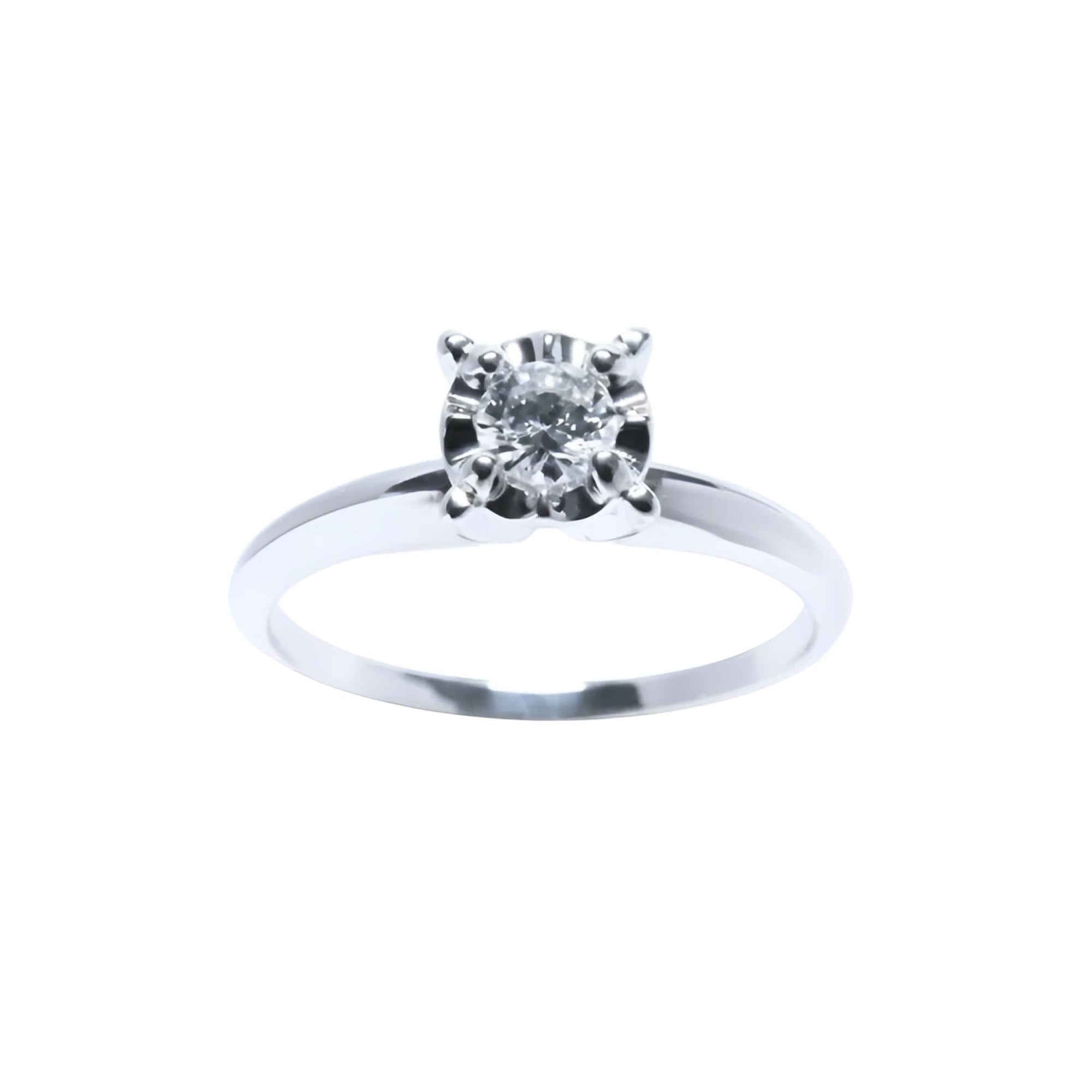 Inexpensive Diamond solitaire engagement ring in 14k whit gold.
