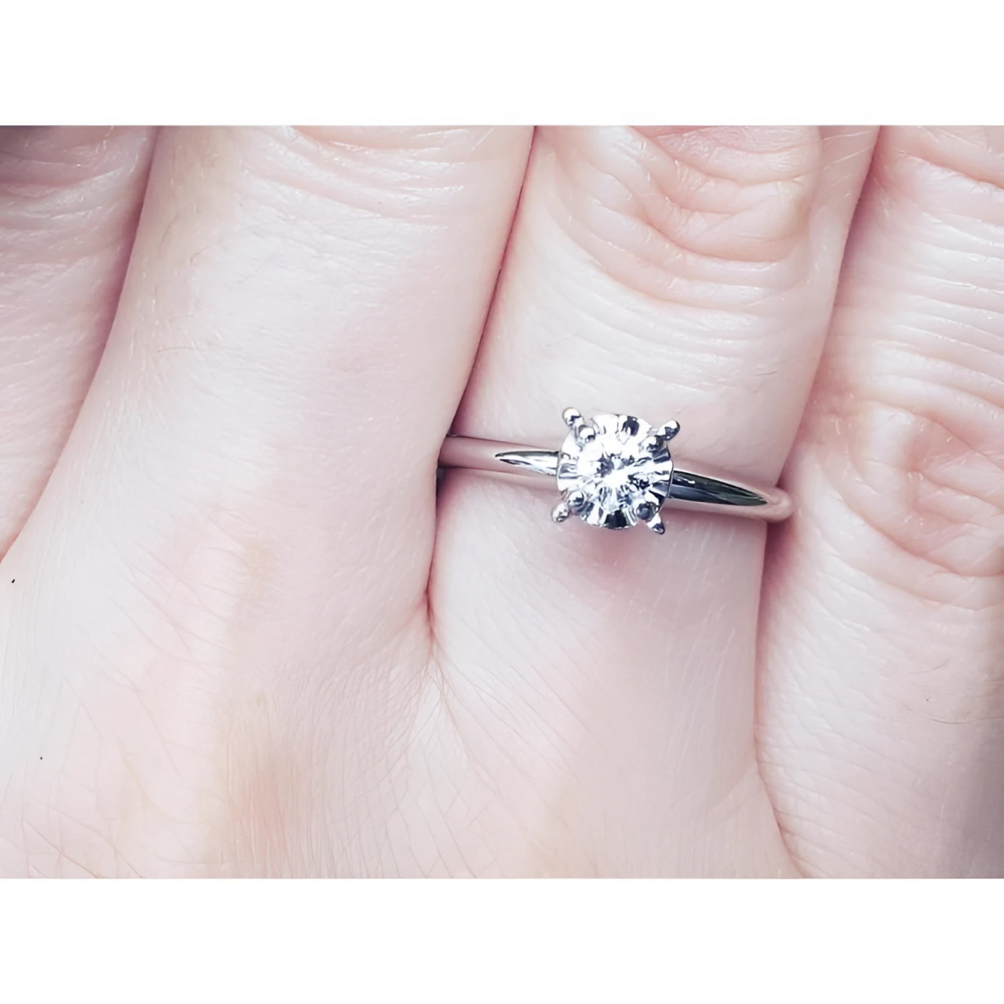 Natural diamond solitaire engagement ring 14k white gold.