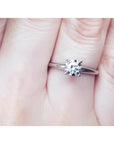 Natural diamond solitaire engagement ring 14k white gold.