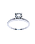 Round cut diamond solitaire engagement ring in 14K white gold with illusion setting.