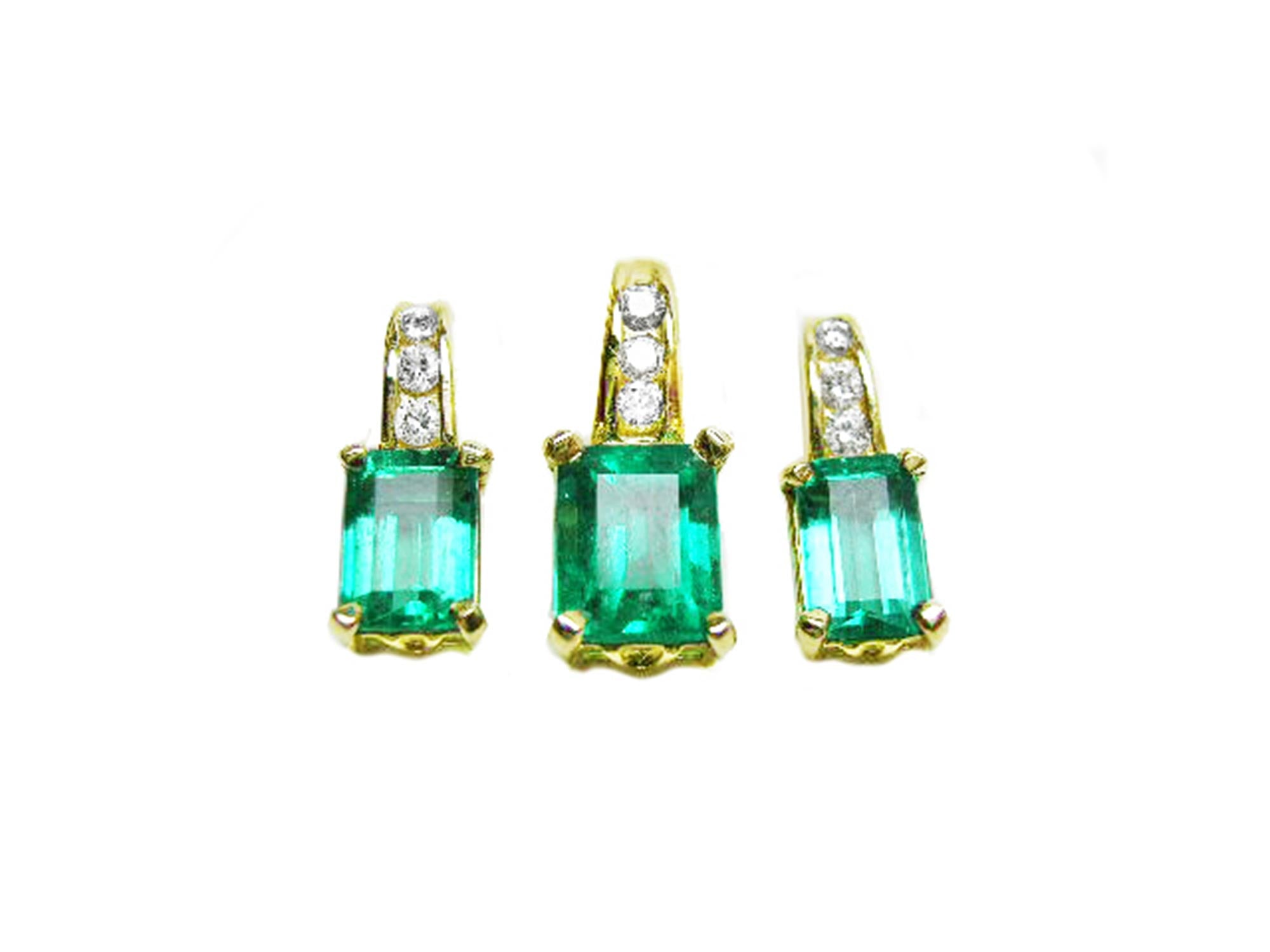 Front position of a trio set of emerald earrings and pendant, accent diamonds in 14k yellow gold, full top side view