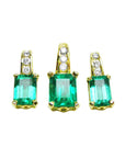 Front position of a trio set of emerald earrings and pendant, accent diamonds in 14k yellow gold, full top side view