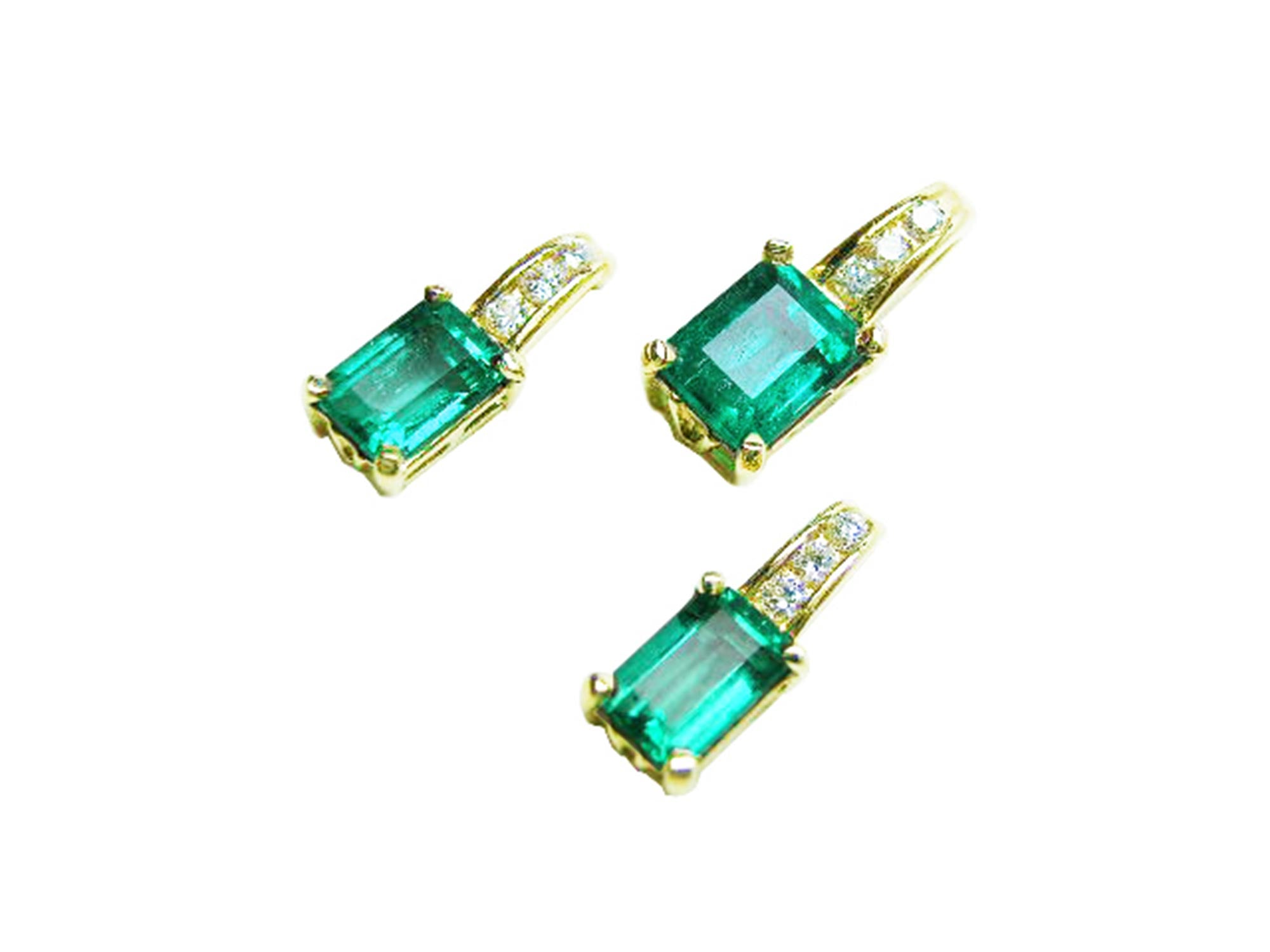 A trio matching set of emerald earrings and pendant in 14k yellow gold, left side position and top view