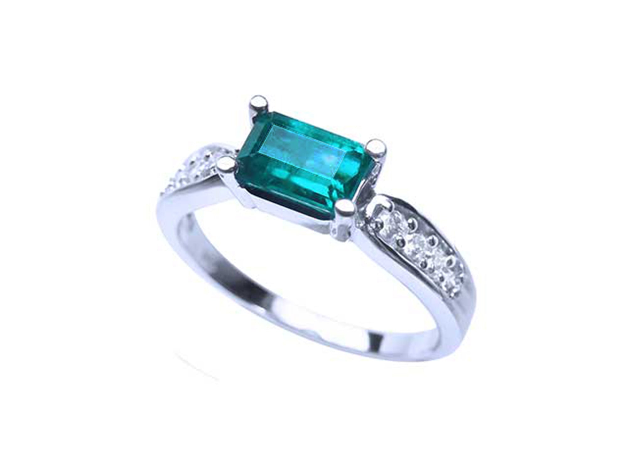 A rectangular emerald-cut natural emerald on top and side view of the band ring in white gold,