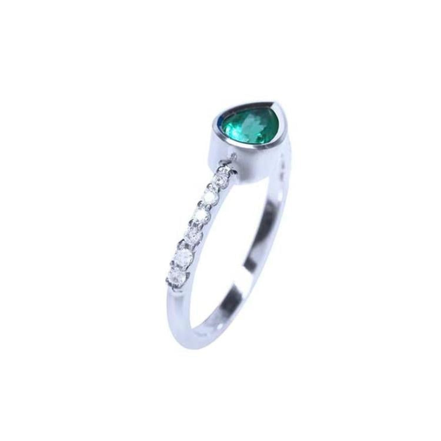 14K white gold ring with an east-west bezel-set teardrop emerald and prong-set accent diamonds.