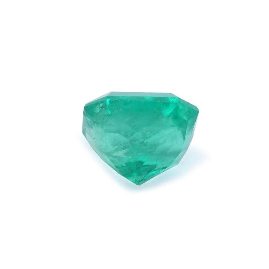 2.95 ct square natural Colombian emerald with bright medium green hue and crystalline clarity.