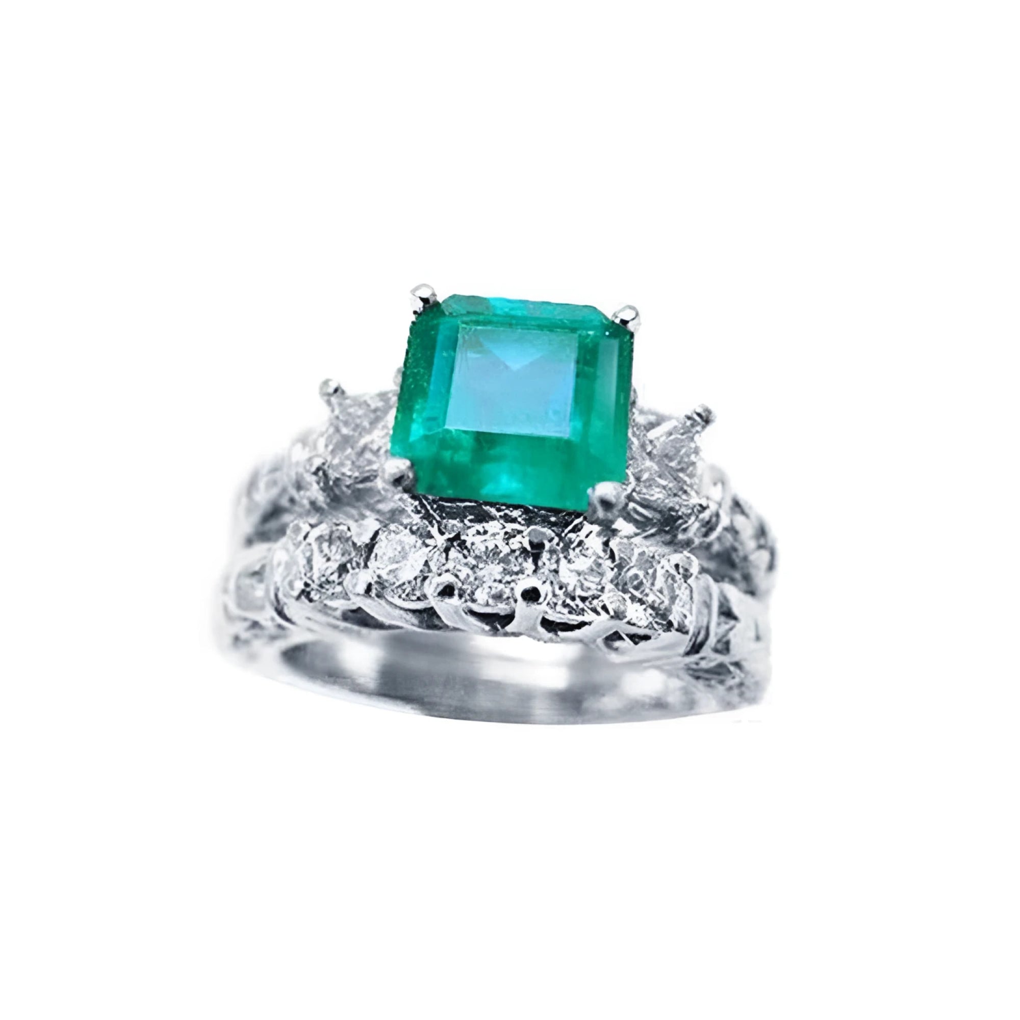 A Muzo Colombian emerald ring with a diamond matching band set in white gold.