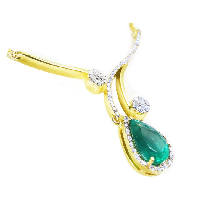 Colombian emerald necklace sourced from the Muzo mines in Colombia a natural pear cut, halo diamond set in 18k yellow gold