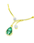 18K yellow gold necklace with a pear-shaped Colombian emerald, surrounded by diamonds, and diamond accents.