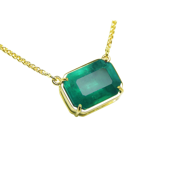 Emerald solitaire necklace 5.52 carats emerald-cut natural from the Muzo mine, set in a handcrafted 18k yellow gold frame